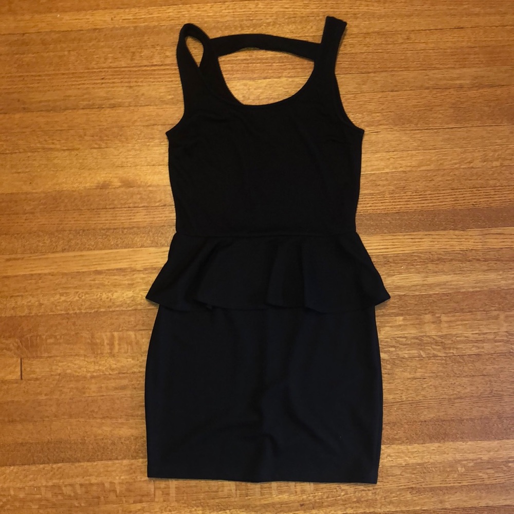 Cute peplum dress with cut out in back